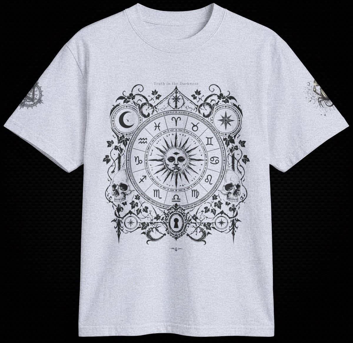 A white short-sleeve crewneck t-shirt featuring a large black gothic celestial graphic on the front with a skull, sun, moon, and zodiac symbols, displayed against a solid black background.