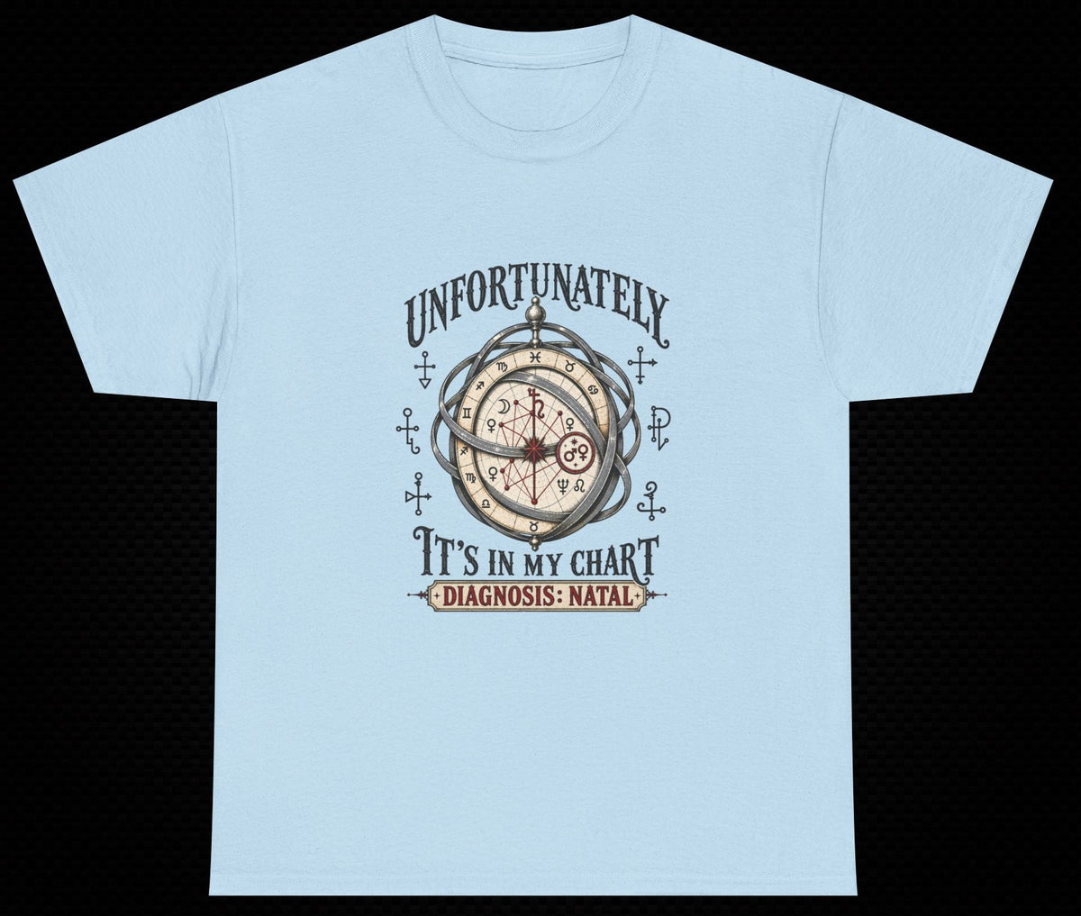 A light blue short-sleeve t-shirt with a vintage-style graphic on the chest featuring a clock, nautical anchors, and the text 'UNFORTUNATELY IT'S IN MY CHART DIAGNOSIS: NATAL' in dark lettering, displayed against a solid black background.